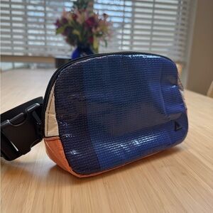 Rareform Zion Crossbody belt bag. Made from recycled billboards. No 2 alike